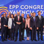 Group of EPP leaders and delegates standing on stage at the EPP Congress in Valencia 2025.