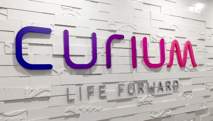 Scientist at Curium’s nuclear medicine lab developing radioligand therapy to target cancer cells