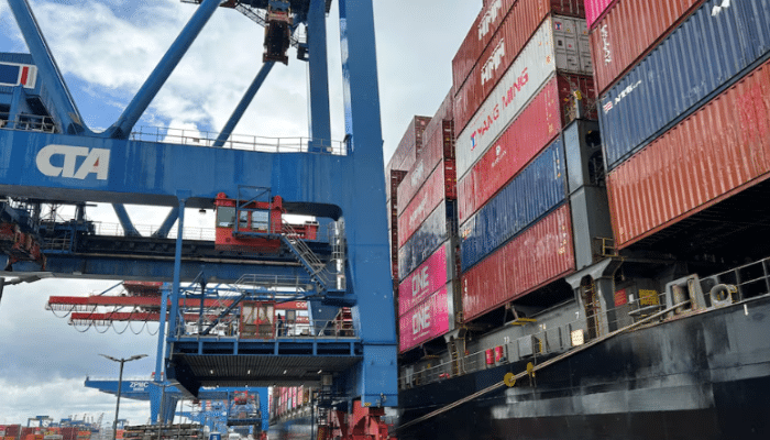 Container ships and cargo trains representing Germany’s export trade with Eastern Europe, symbolizing economic recovery and regional cooperation.