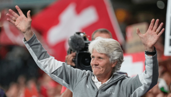 Pia Sundhage celebrating with the Switzerland women’s football team after their Euro 2025 quarterfinal victory.