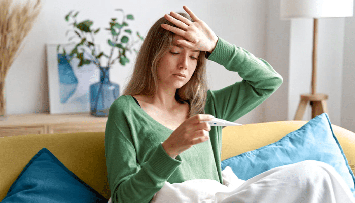Doctor explaining leptospirosis risk during India’s monsoon season, warning that viral fever symptoms can be mistaken for this serious rat-borne infection