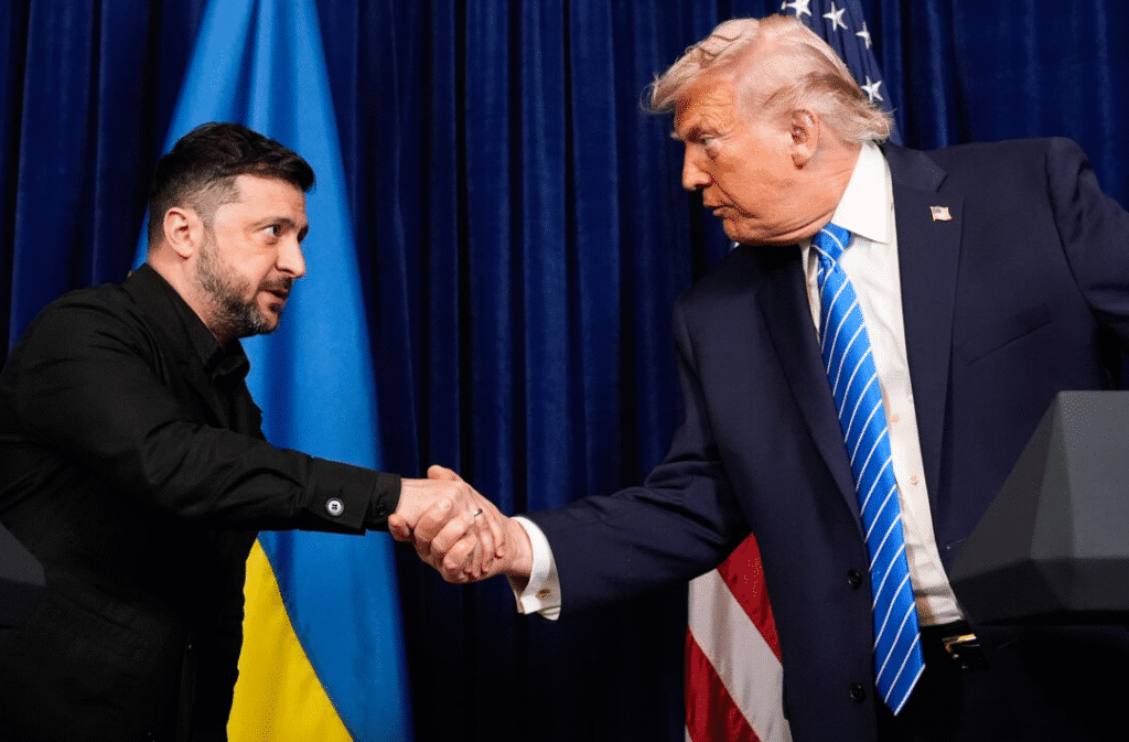 Alt TextTitle/CaptionDescriptionFile URLPresident Donald Trump and Ukrainian President Volodymyr Zelenskyy shaking hands during peace talks at Mar-a-Lago in December 2025