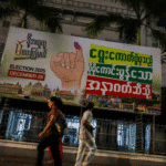 Myanmar election officials oversee voting preparations under military supervision as critics question the fairness of the 2025 general election.