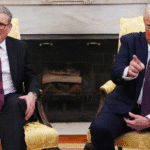 Aerial view of Diego Garcia in the Chagos Archipelago showing a U.S. military airbase with runways, aircraft, and support facilities.