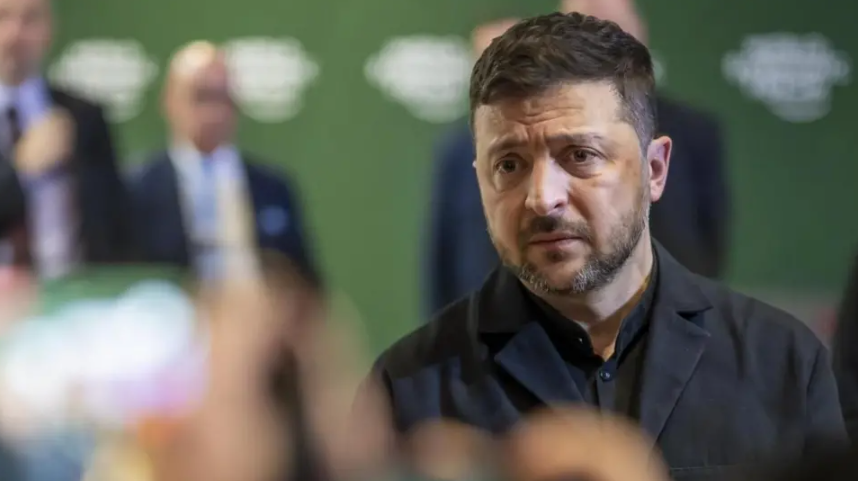 President Volodymyr Zelensky speaking to reporters at the World Economic Forum in Davos on 22 January 2026.