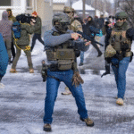 Protesters demonstrate against U.S. Immigration and Customs Enforcement as scrutiny grows over corporate contracts linked to deportation operations.